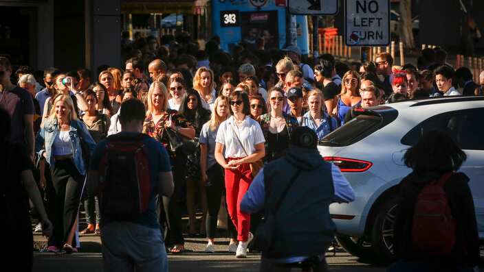 Commuters leave Central Station in Surry Hills, Sydney, January 18, 2018. (AAP Image/Glenn Campbell) NO ARCHIVING