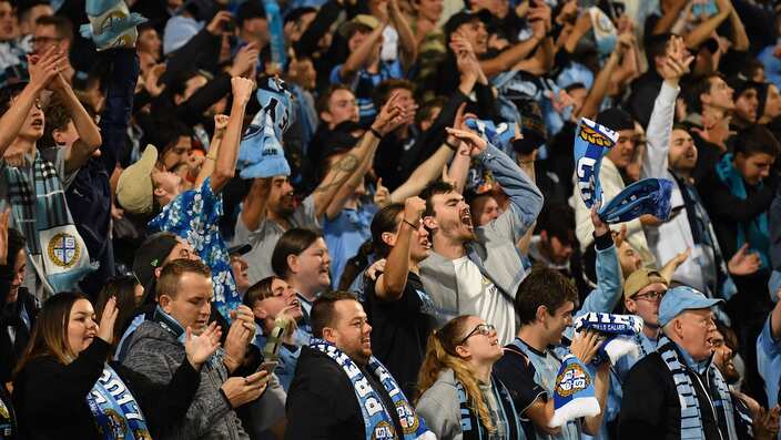 Sydney FC fans celebrate during the A-League Semi Final 2 match between Sydney FC and Melbourne Victory at Netstrata Jubilee Stadium in Sydney, Sunday, May 12, 2019. (AAP Image/Dean Lewins) NO ARCHIVING, EDITORIAL USE ONLY