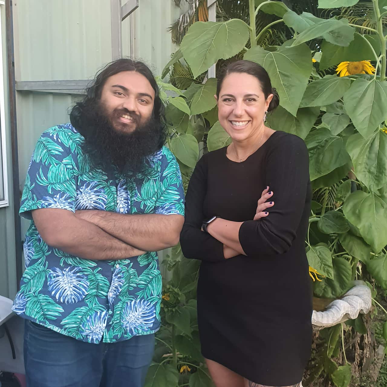 photo of Tala Amhaz with host of My First year on Aussie Soil Suraj Kolarkar in front of plants