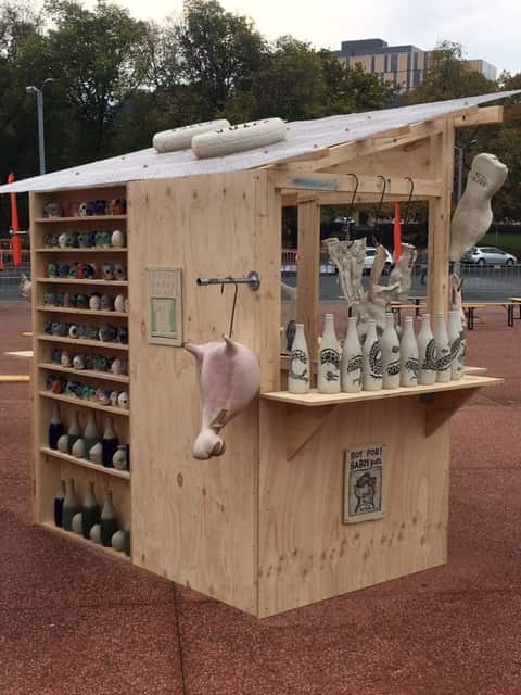 Wooden stall houses art ceramics