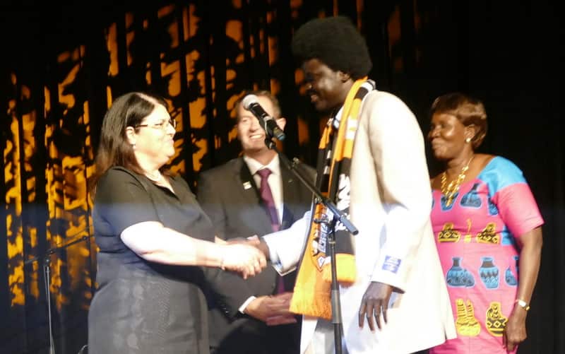 Hon Grace Grace congratulating Aguek Nyok