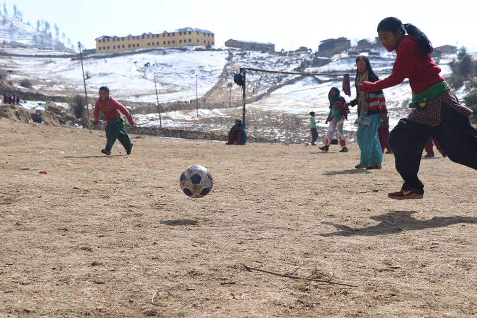 Nepali girls playing soccer