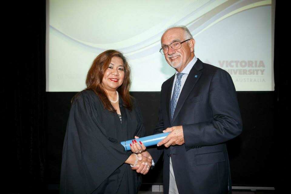 Maria Teresa Abadilla completing her Certificate IV in Training and Assessment at Victoria University in 2014.