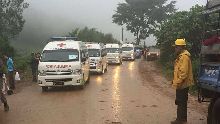 Row of ambulances heading into Thai cave site - amid reports the rescue is underway or at very least imminent.