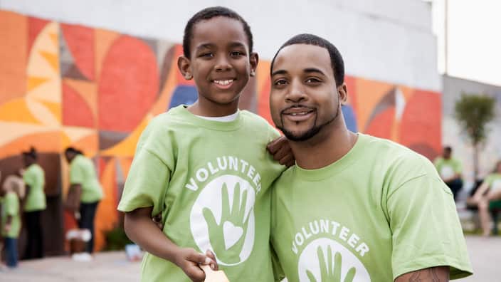 Father and son volunteering