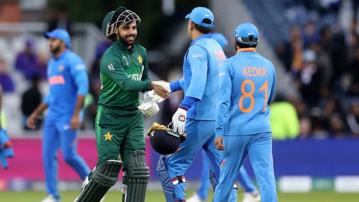 Pakistan's Shadab Khan shakes hands with India's MS Dhoni after the ICC Cricket World Cup match at Old Trafford, Manchester. Photo: Martin Rickett/PA Wire.