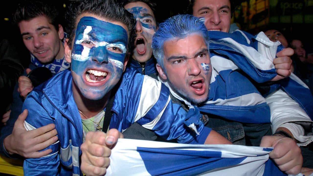 July 5, 2004. Greek-Australian soccer fans celebrate the victory at Euro 2004 in Melbourne's Lonsdale Street 