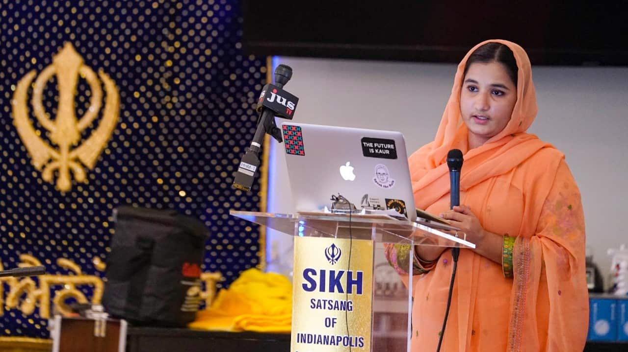 Aasees Kaur, legal client and community services manager of the Sikh Coalition reads a statement on the groups response after the group met at the Sikh Satsang of Indianapolis in Indianapolis, Saturday, April 17, 2021