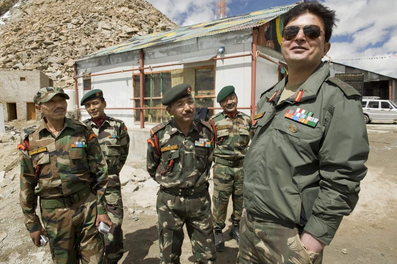 A colonel in the Indian army (far right, name withheld), stands with members of the Ladakh scouts at Khardung La, a mountain pass in the Laddakh, India.