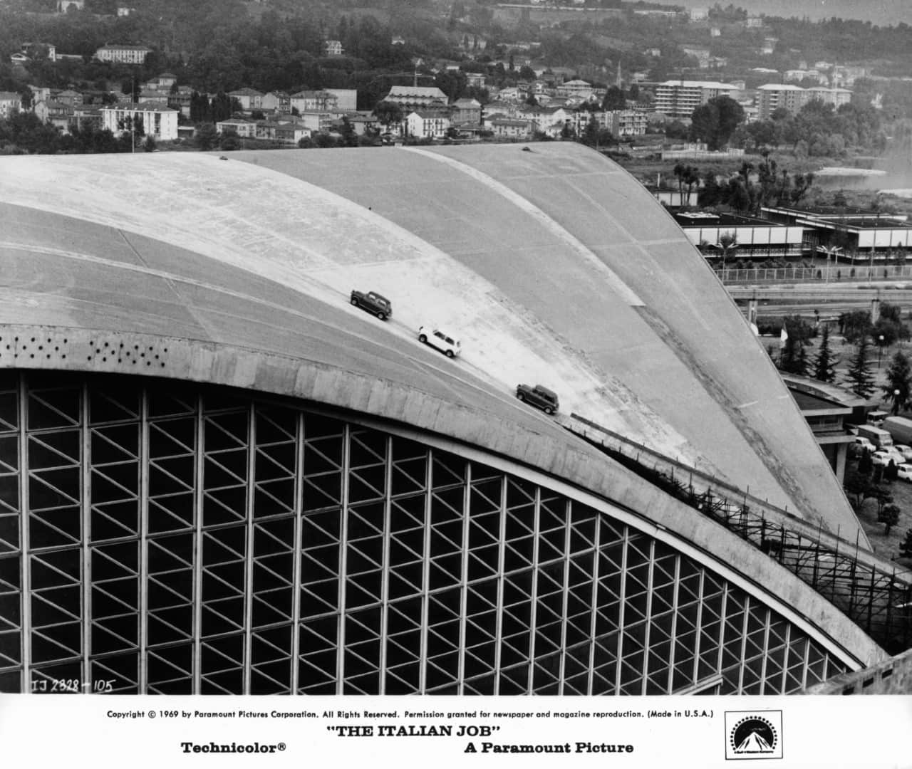 Cars racing up roof of Palavela in Turin in a scene from the film 'The Italian Job', 1969.
