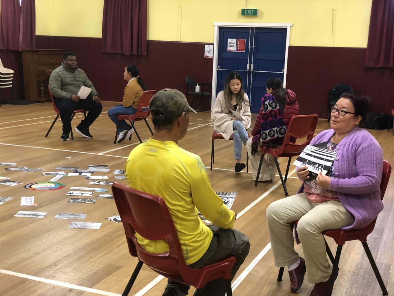 Participants and facilitators are seen engaging in pair activities during the Alternatives to Violence workshop from July 31st to Aug 2nd at Northern suburb community centre in Rocherlea, Tasmania. 