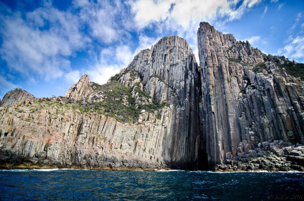 towering-dolerite-cliffs-rise-from-the-sea-at-tasman-national-park.jpg