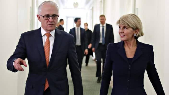 Incumbent Australian Prime Minister Malcolm Turnbull walks with Foreign Minister Julie Bishop 