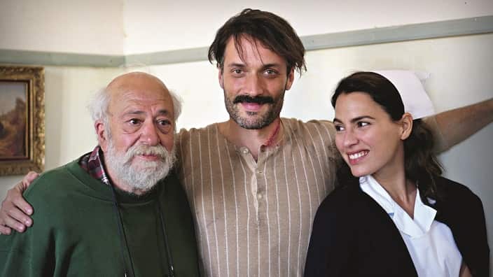 Actors Andreas Konstantinou (M) and Melia Kreiling (R) with 'Last Note''s director Pantelis Voulgaris. 