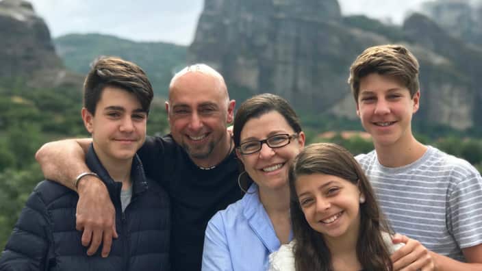 Christine Polyzos with her family in Meteora
