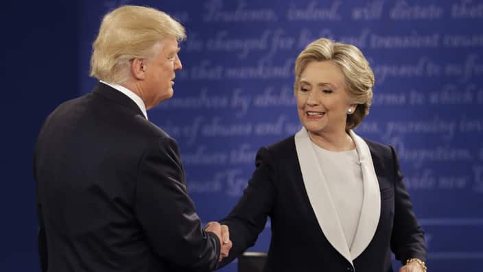 Republican presidential nominee Donald Trump and Democratic presidential nominee Hillary Clinton shakes following the second presidential debate at Washington University in St. Louis, Sunday, Oct. 9, 2016. (AP Photo/John Locher)