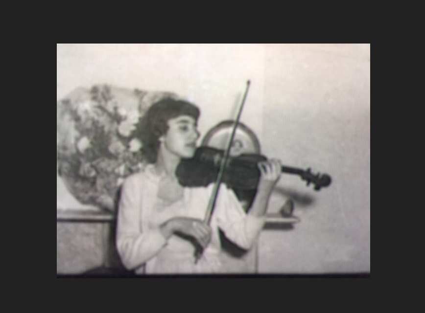 Vange playing violin