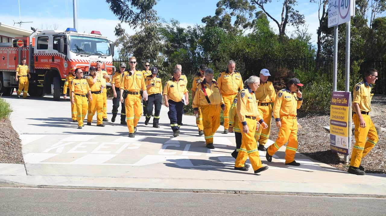 Volunteer fire fighters are seen on duty at Menai Rural Fire Service Station, in Sydney, Monday, April 16, 2018.