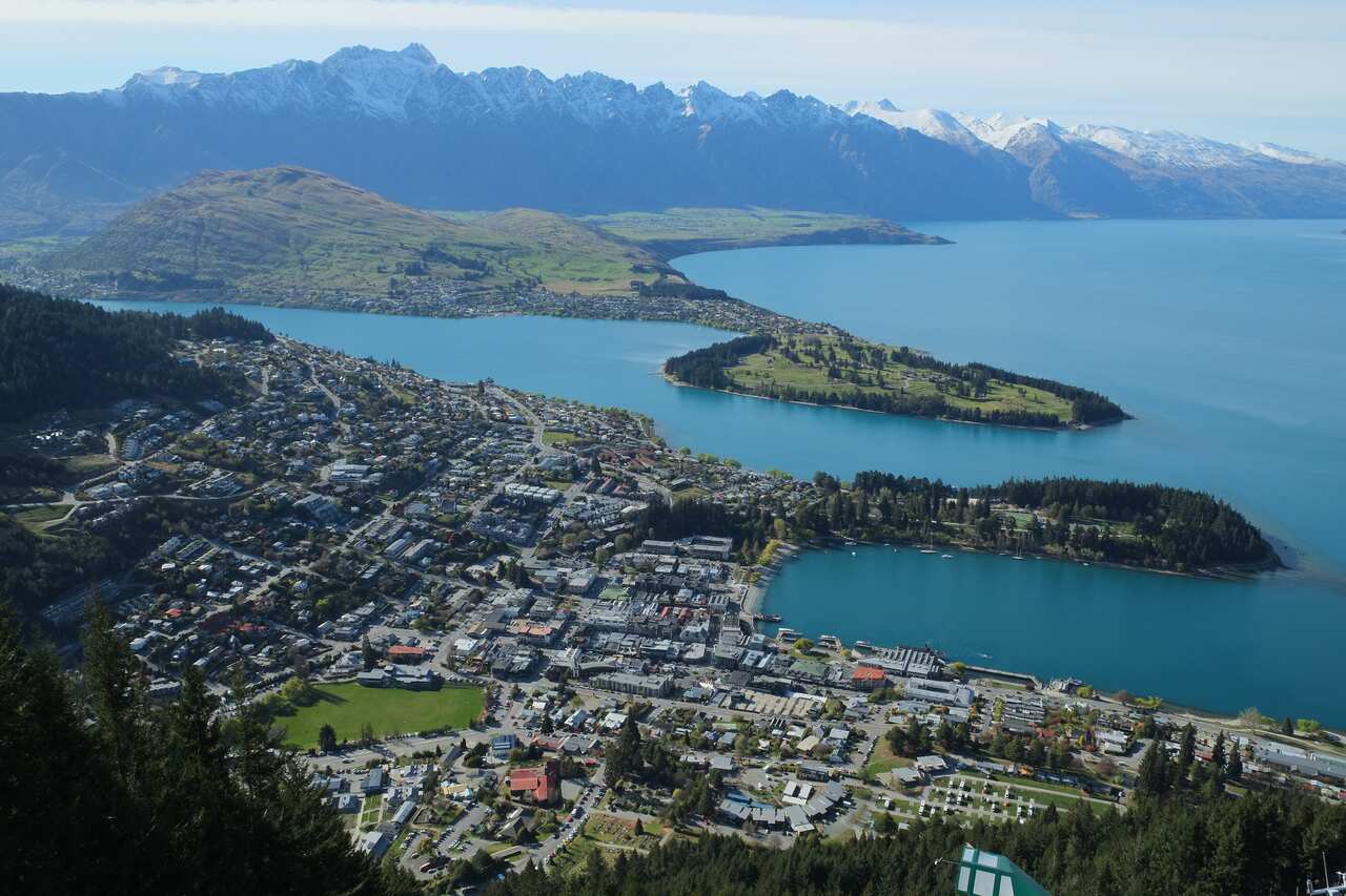 Morning view from lookout over Queenstown towards the Remarkables in spring