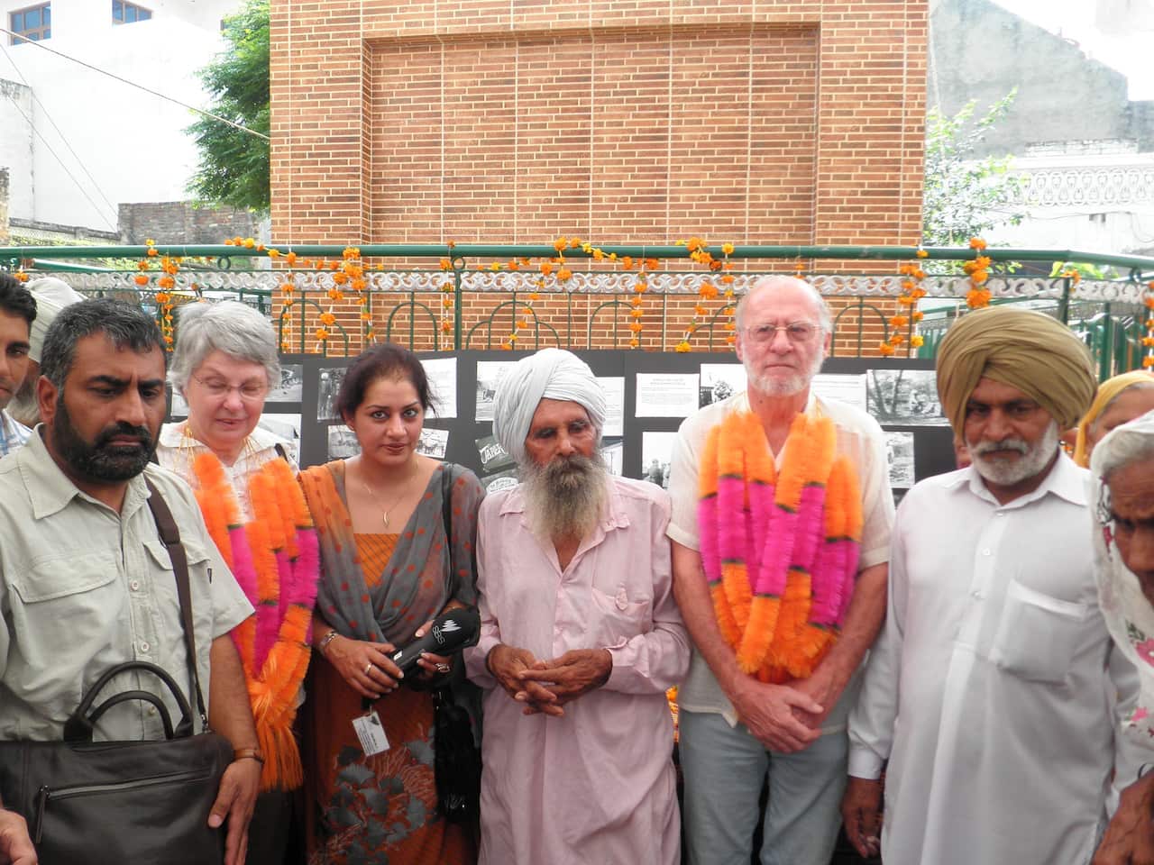 The entire village turned out to greet the group escorting Pooran's ashes from Australia