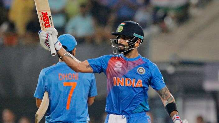 India's Virat Kohli celebrates his fifty runs during the ICC World Twenty20 2016 cricket match against Pakistan at Eden Gardens in Kolkata, India, Saturday, March 19, 2016. (AP Photo/ Bikas Das)