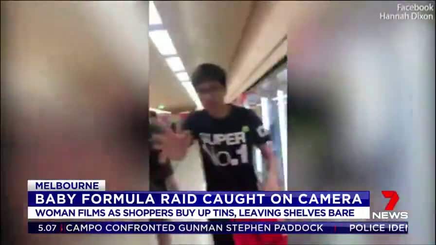 Teams of shoppers strip baby formula from shelves.