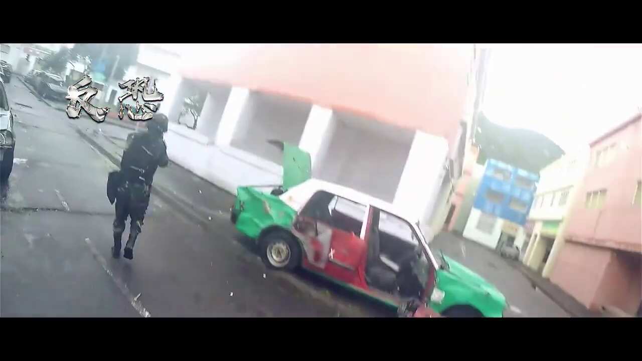 China warns Hong Kong protesters with slick military video