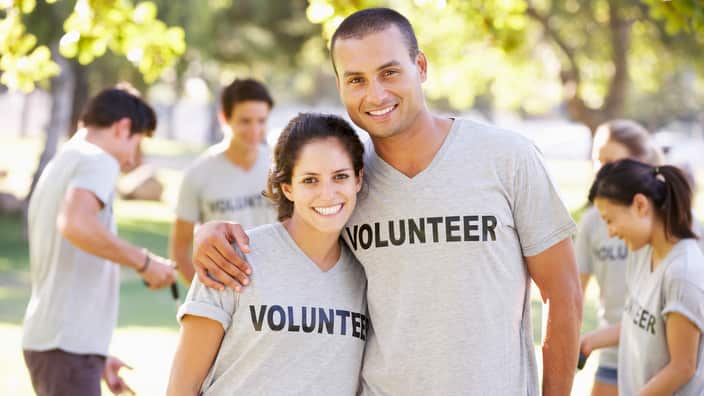 Volunteer Group Clearing Litter In Park
