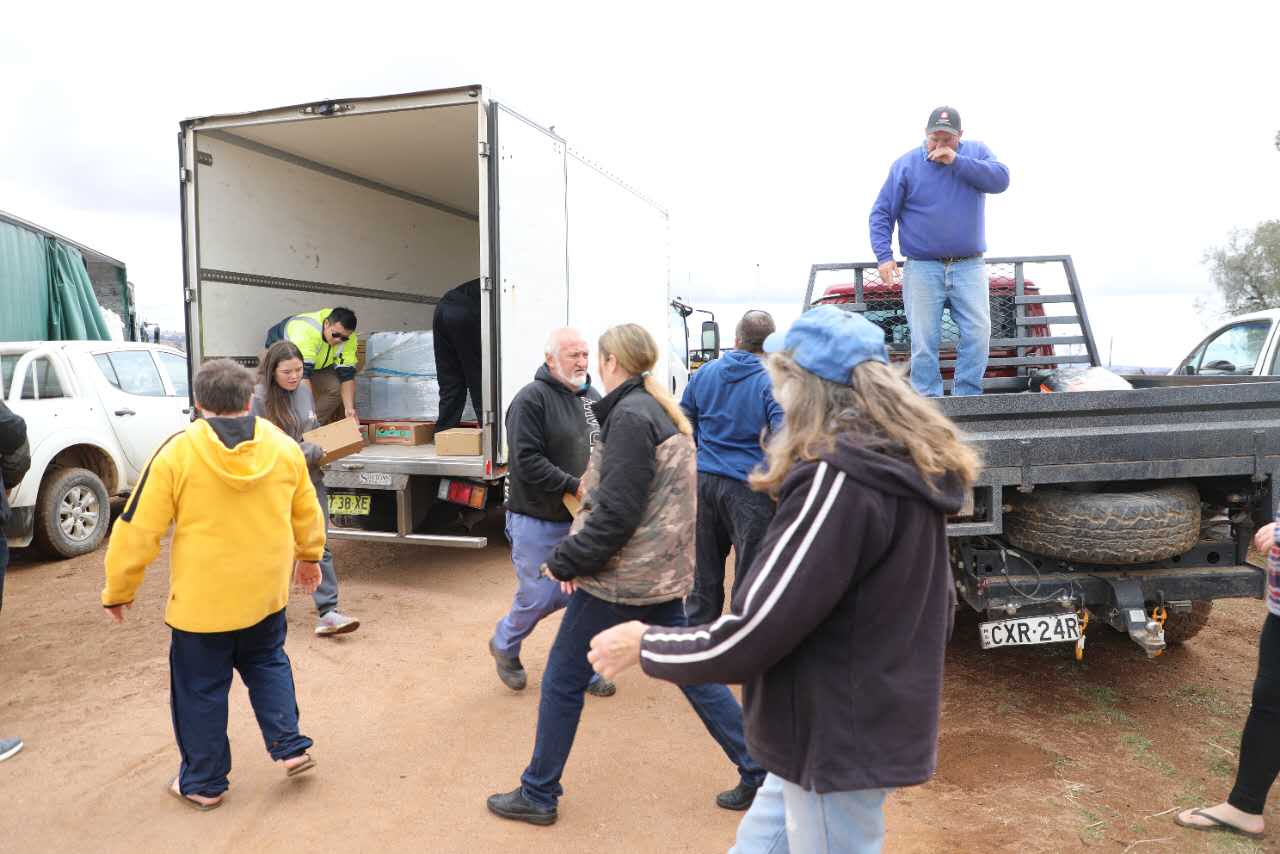 Part of the donation team and the farmers