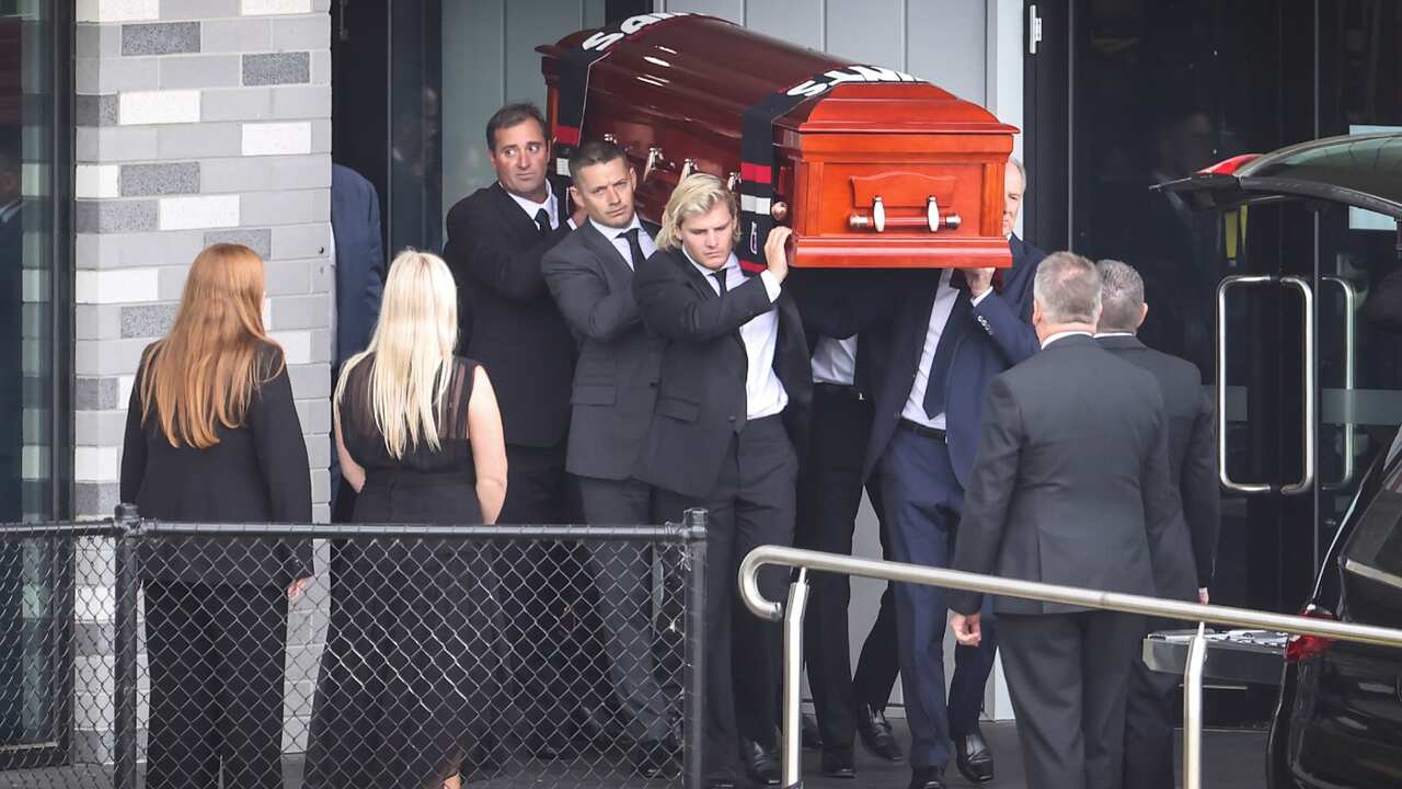 Family and friends attend the funeral service for former Australian cricket player Shane Warne at St Kilda Football Club on March 20, 2022 in Melbourne, Australia.
