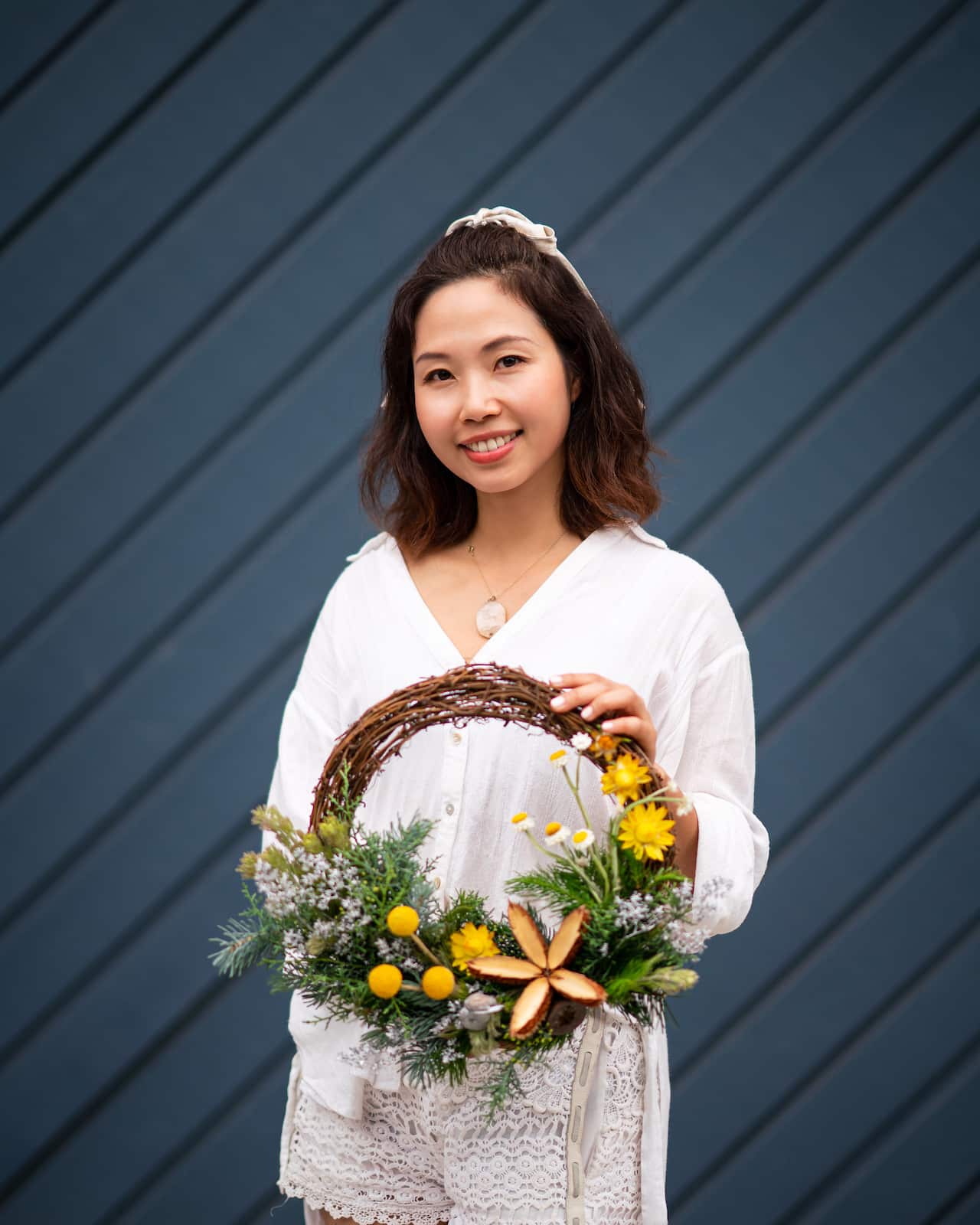 Nikki手执用巨盘木果实作为主花的圣诞花环