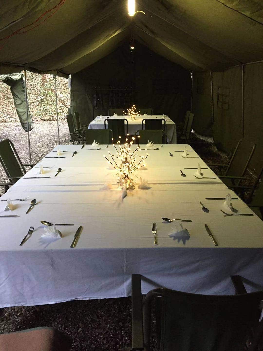 Royal Australian Airforce caterer Vivienne Jin helped set up the table on the camping site.