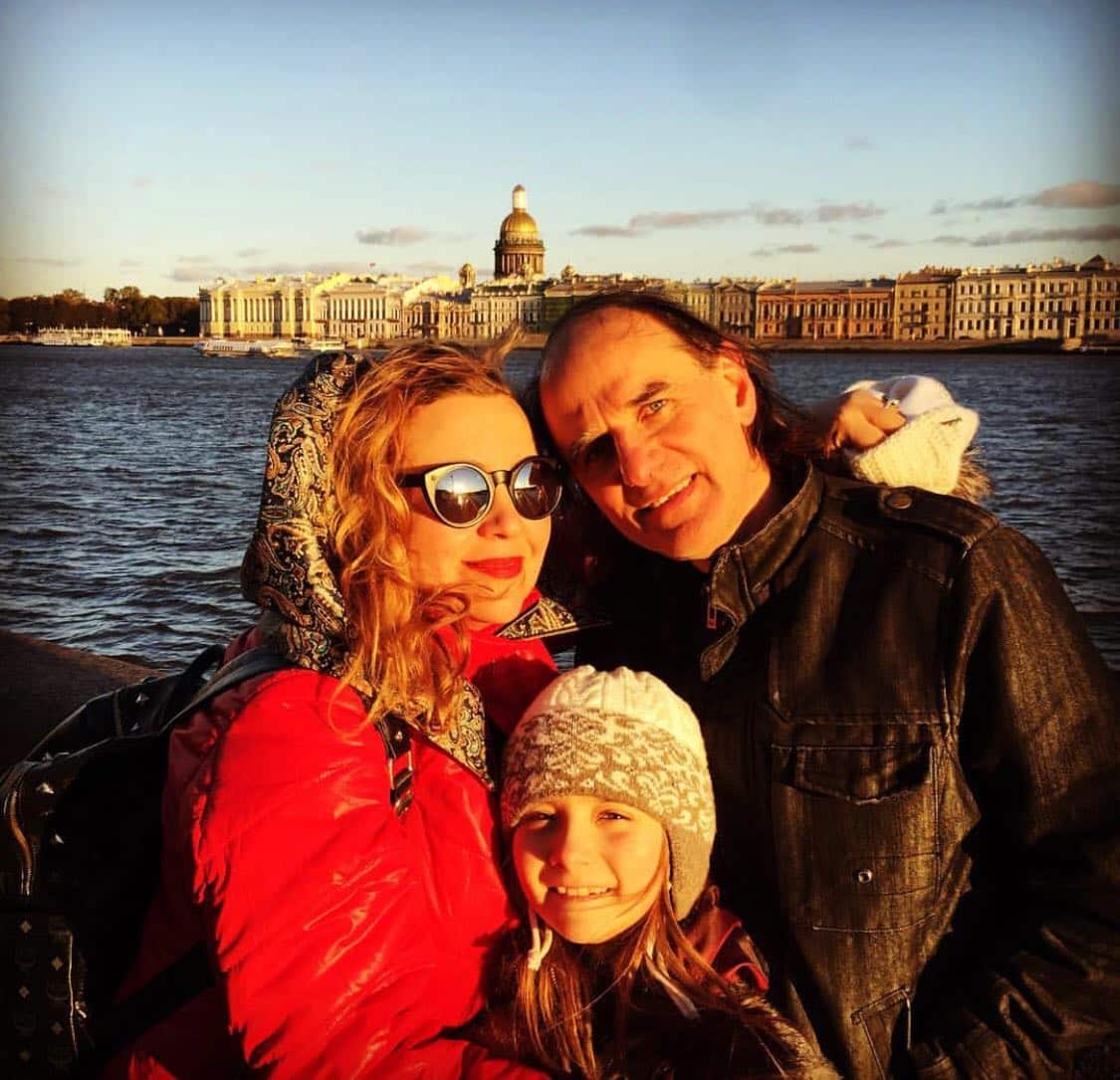 Aelita Andre with her parents Nikka Kalashnikova and Michael Andre in St. Petersburg