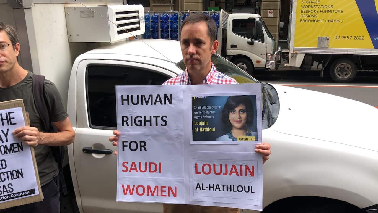 Activist protesting with Saudi women 