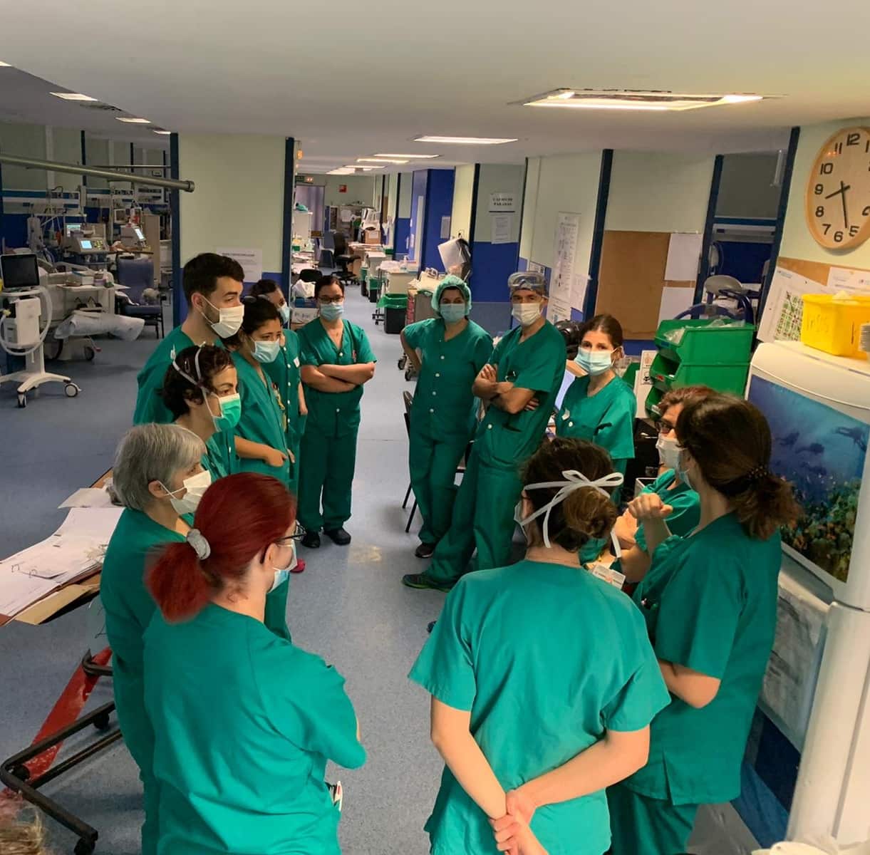 ICU staff briefing in Spanish hospital