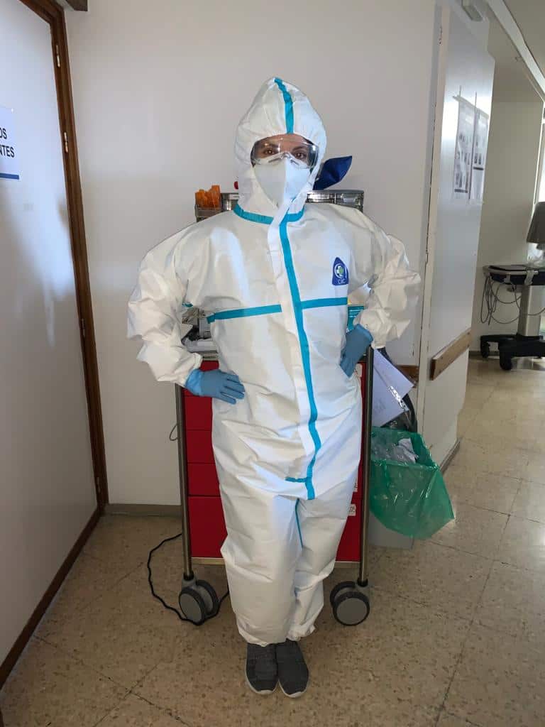 Spanish ICU nurse Maribel poses with PPE.