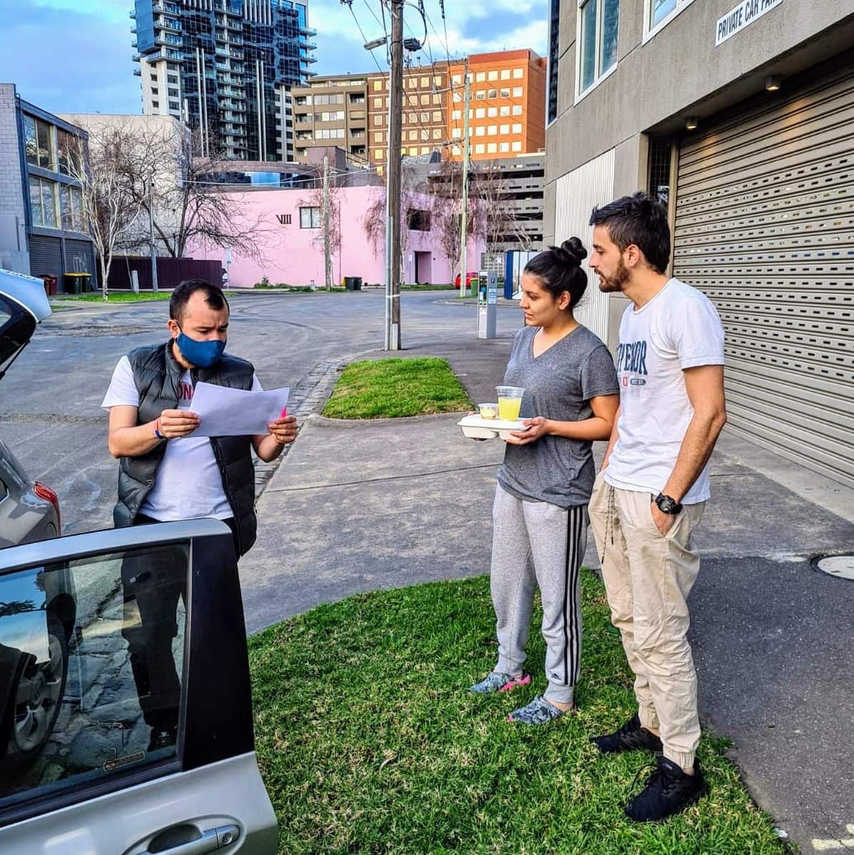 Berbeo Bros Restaurant owner, Juan Camilo Berbeo, delivering free meals to international students.