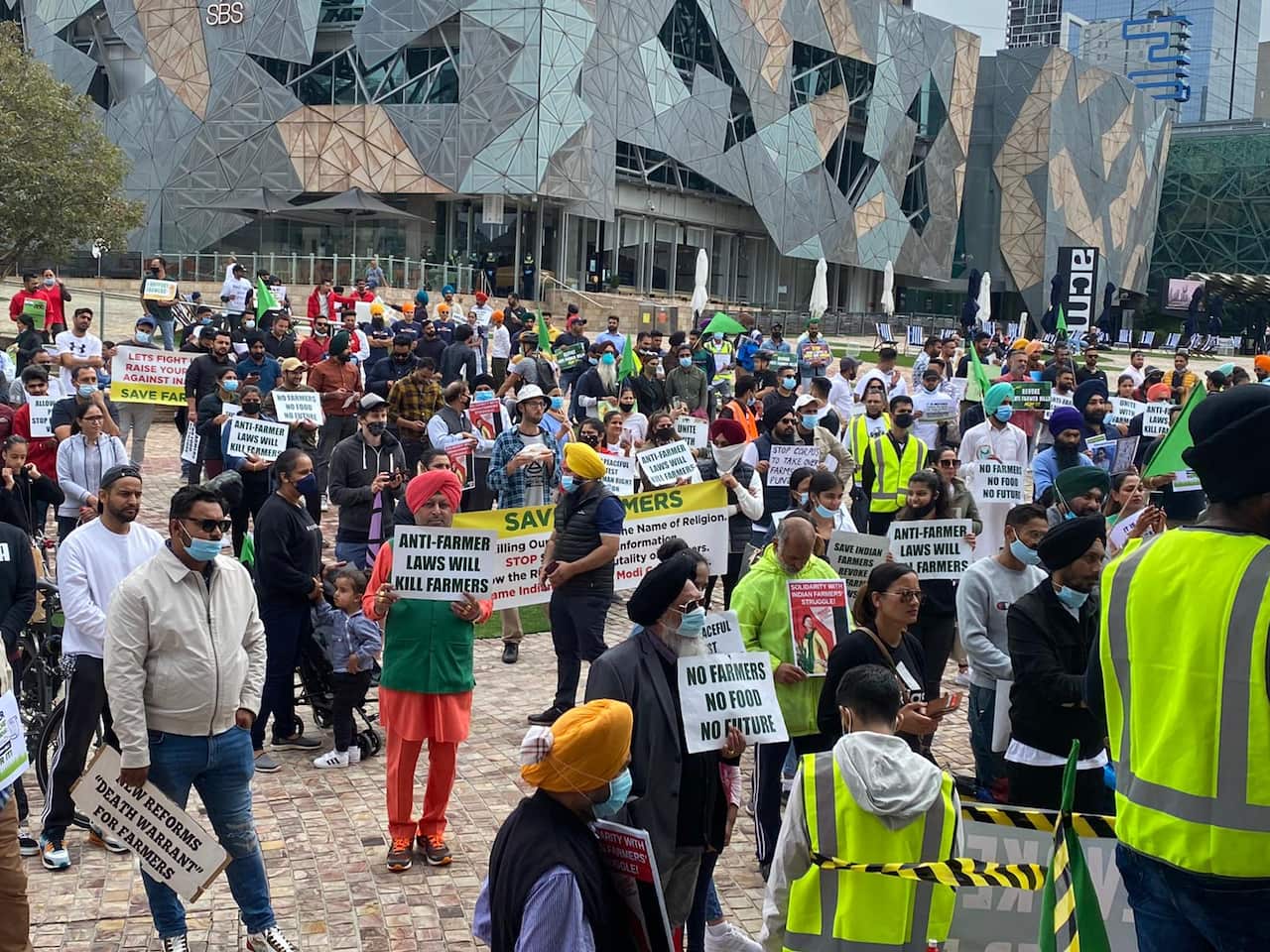 A group of prtesters at the Federation Square, Melbourne.