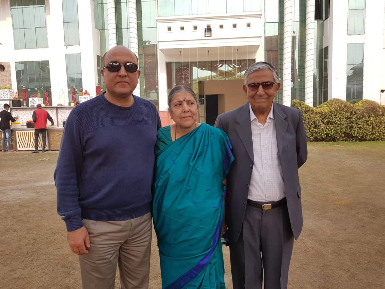Rakhil Razdan (left) with his parents. His parents fearing for their lives left Kashmir in March 1990.