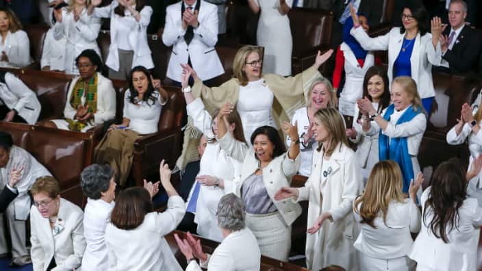 Democratic women House of Representatives members react during US President Donald J. Trump's State of the Union address