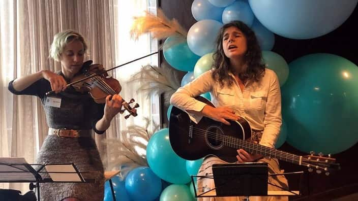 Musician Pascal Latra performs at the 1st Women's Forum, of the Greek Community of Melbourne. 