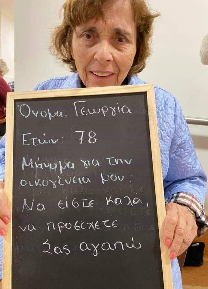 grandma with chalkboard message