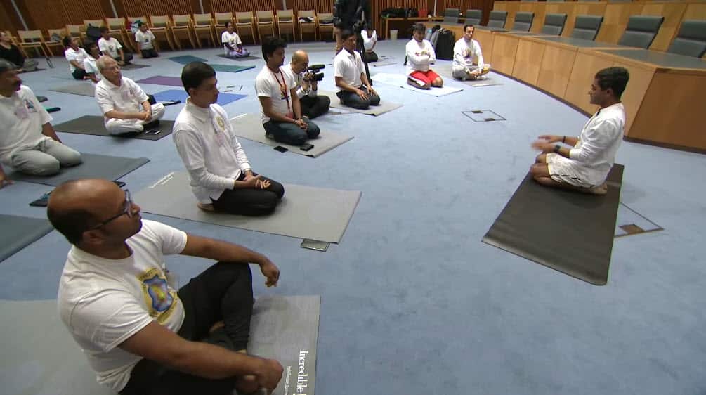 People practicing Yoga in the Federal Parliament in Canberra