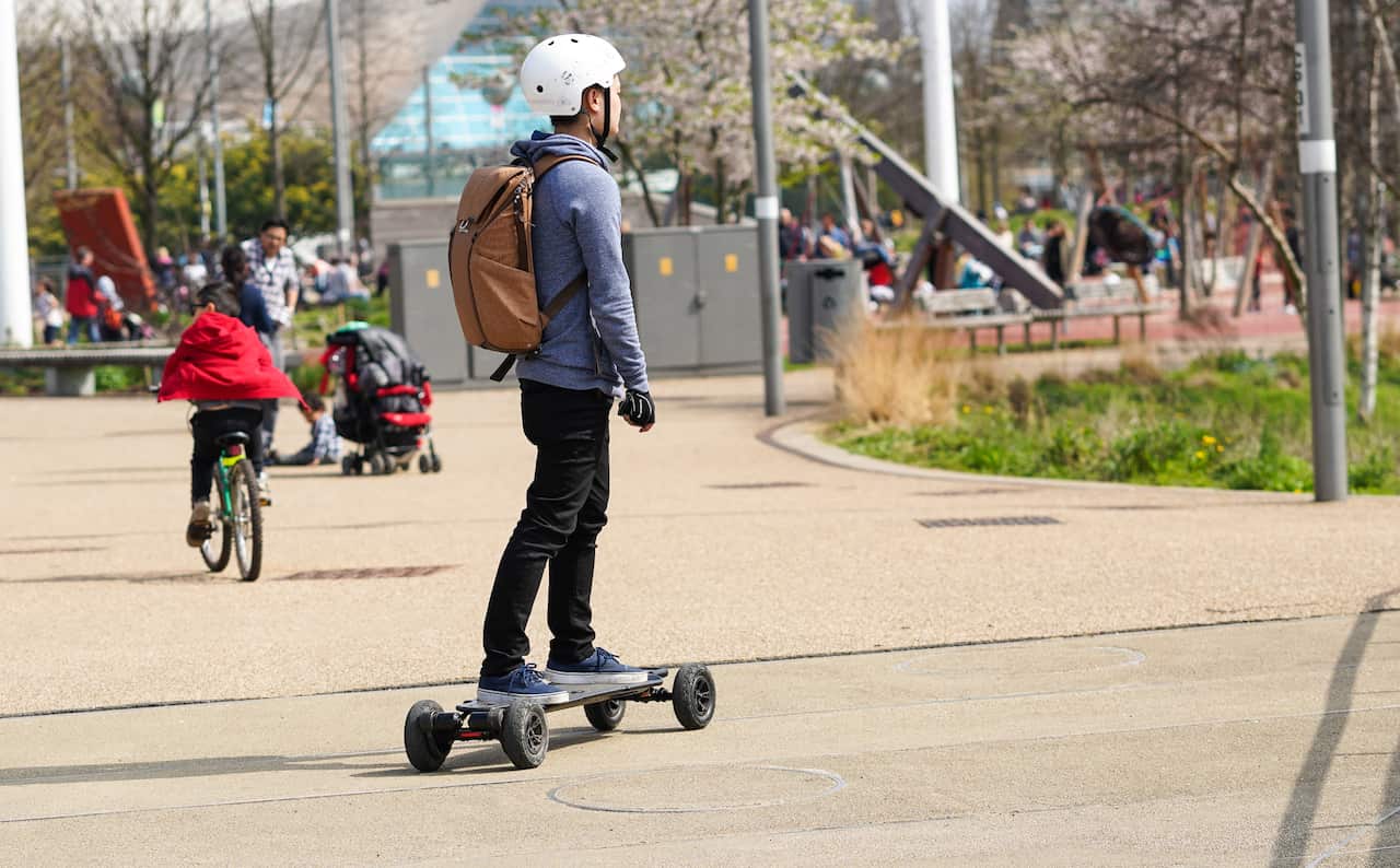 Boy on electric skateboard
