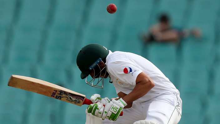 Pakistan's Younis Khan ducks under a delivery from Australia's Mitchell Starc during their cricket test match in Sydney, Australia, Wednesday, Jan. 4, 2017. (AP Photo/Rick Rycroft)