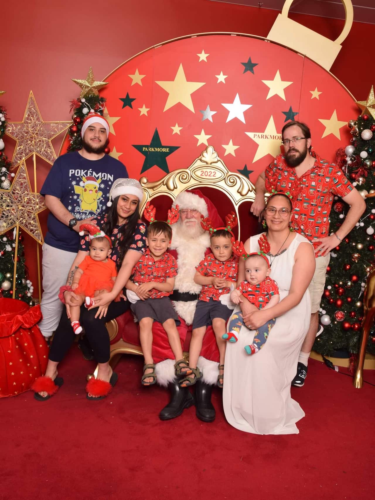A family getting a Santa portrait taken.