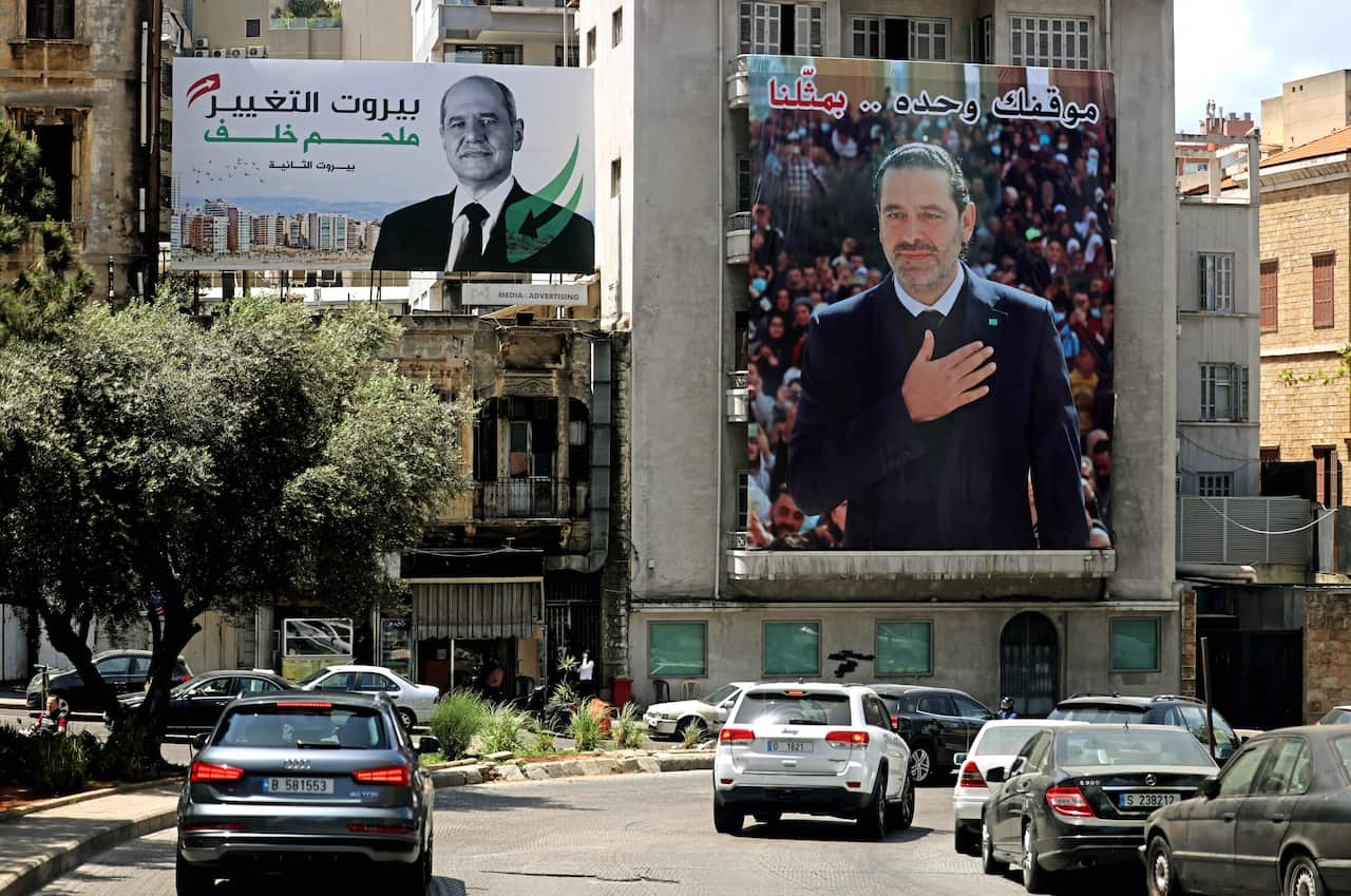 Two large billboards on buildings in Beirut.