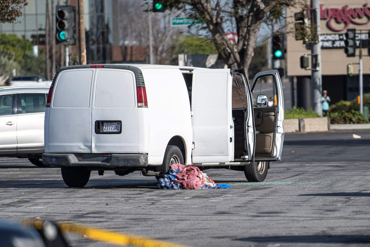 A view of the white Van in which Monterey Park mass shooting suspect, Huu Can Trann (72) has been found with a self inflicted gun shot wound to the head in Torrance.