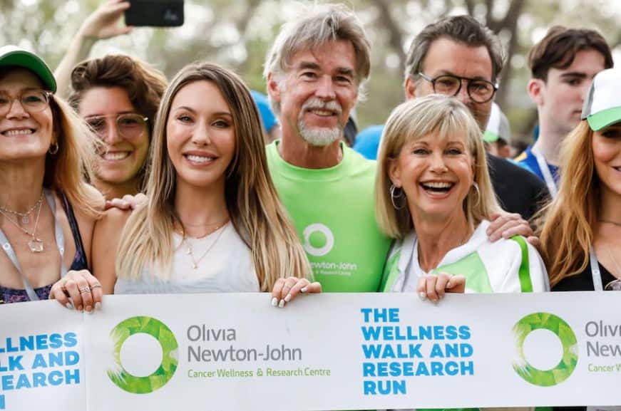 newton johjn charity work.jpg