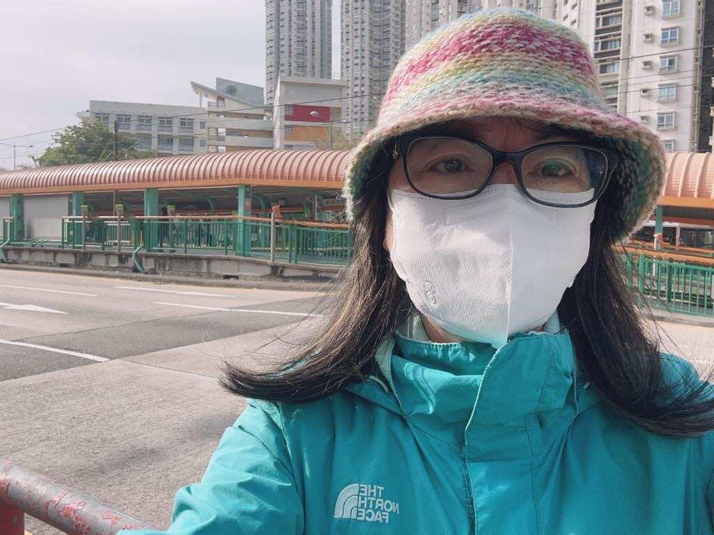 Woman wearing a mask.